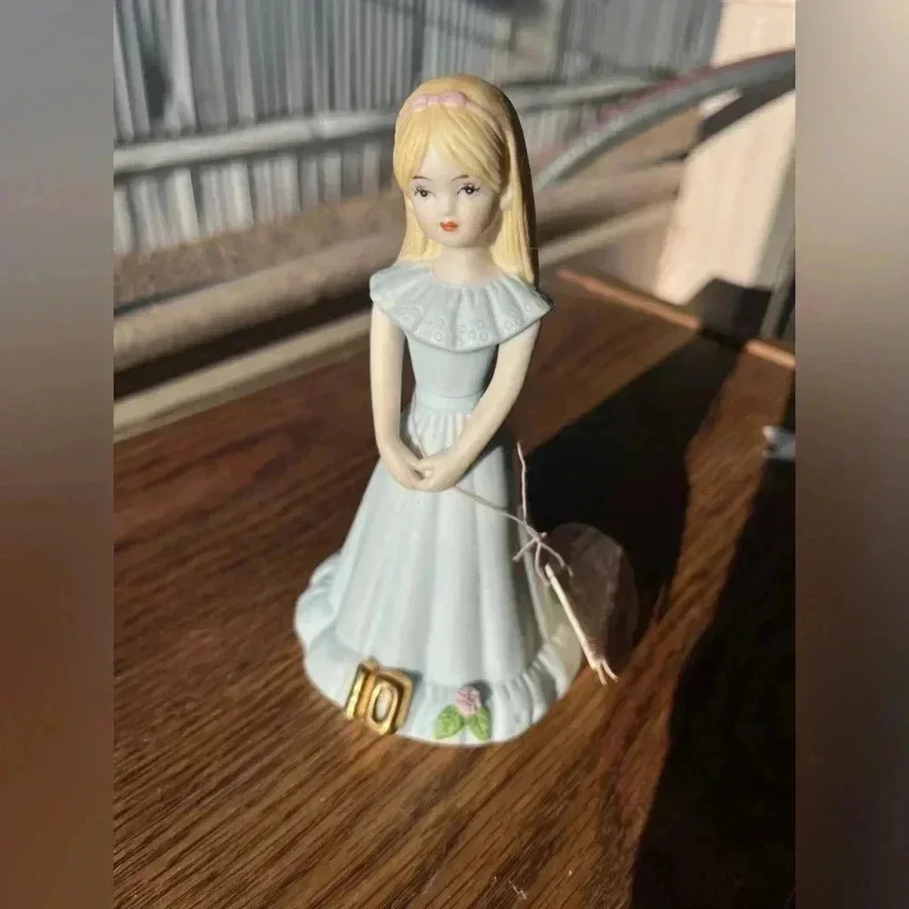 Porcelain doll figurine growing up brand age 10